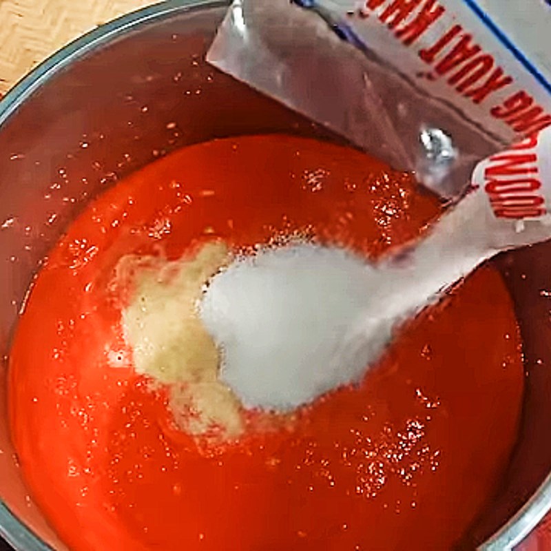 Bước 2 Trộn và nấu hỗn hợp gấc xay Chè lam gấc