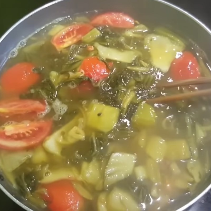 Bước 4 Nấu lẩu dưa chua và hoàn thành Lẩu cá chép om dưa