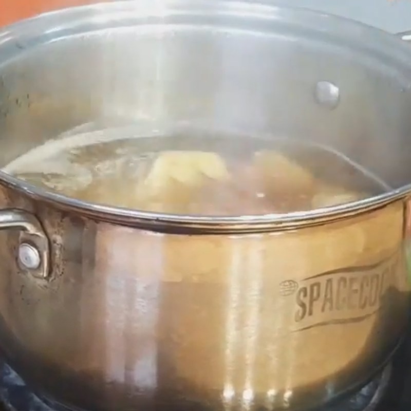 Bước 3 Nấu canh chua khô cá dứa Canh chua khô cá dứa dọc mùng