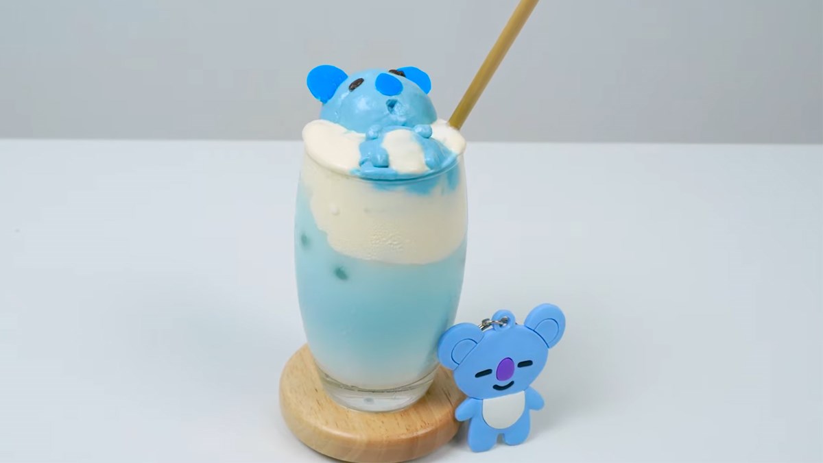 Trà sữa hoa đậu biếc macchiato kem dừa