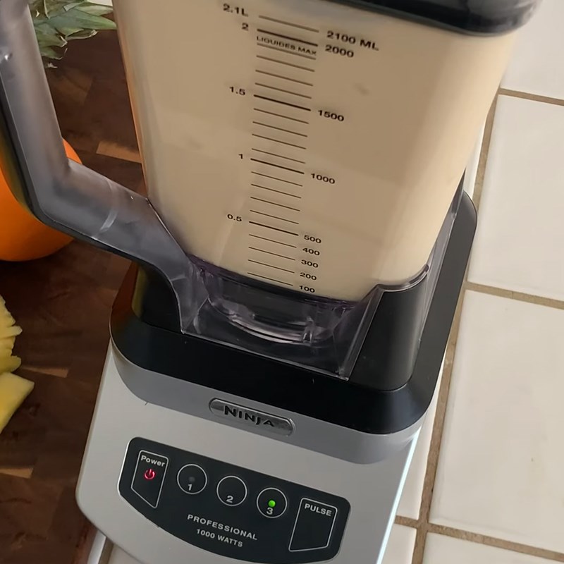 Bước 3 Xay và lọc hỗn hợp nước cam dứa Nước ép cam dứa