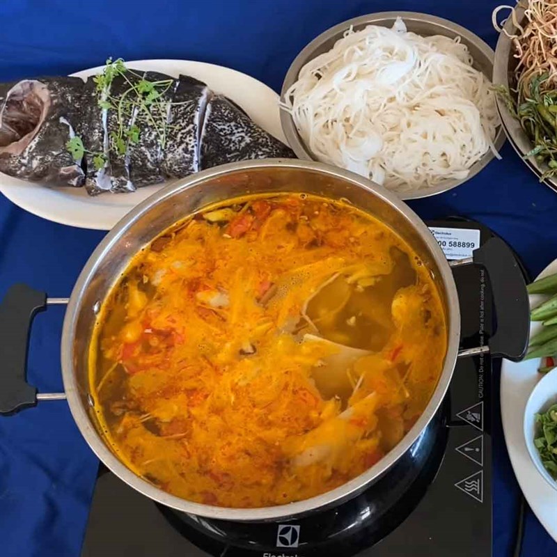 Bước 4 Nấu lẩu Lẩu cá mú măng chua