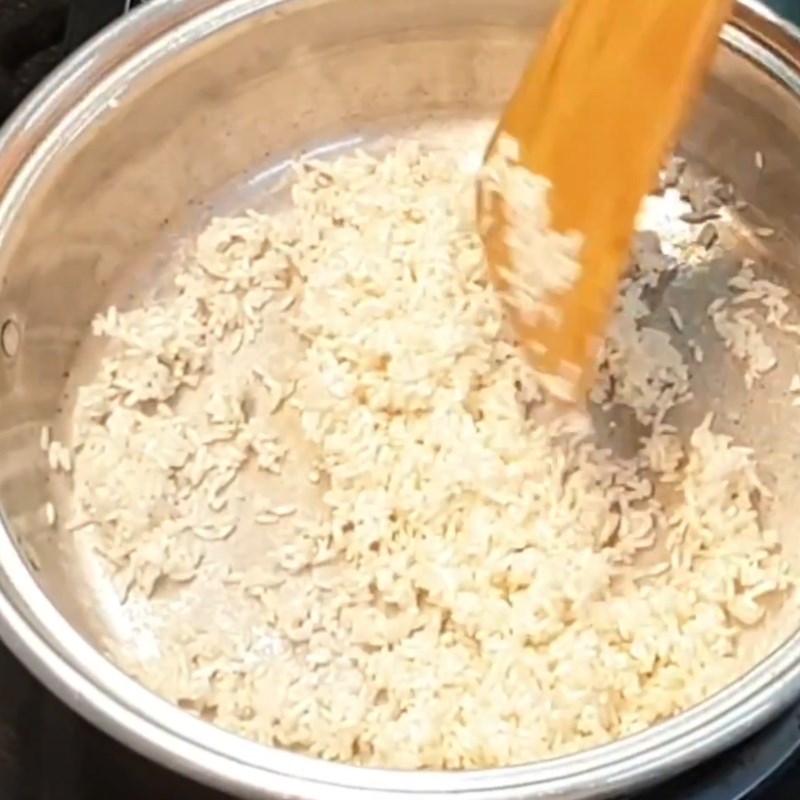 Bước 5 Rang gạo và nấu cháo Cháo gà nấm rơm