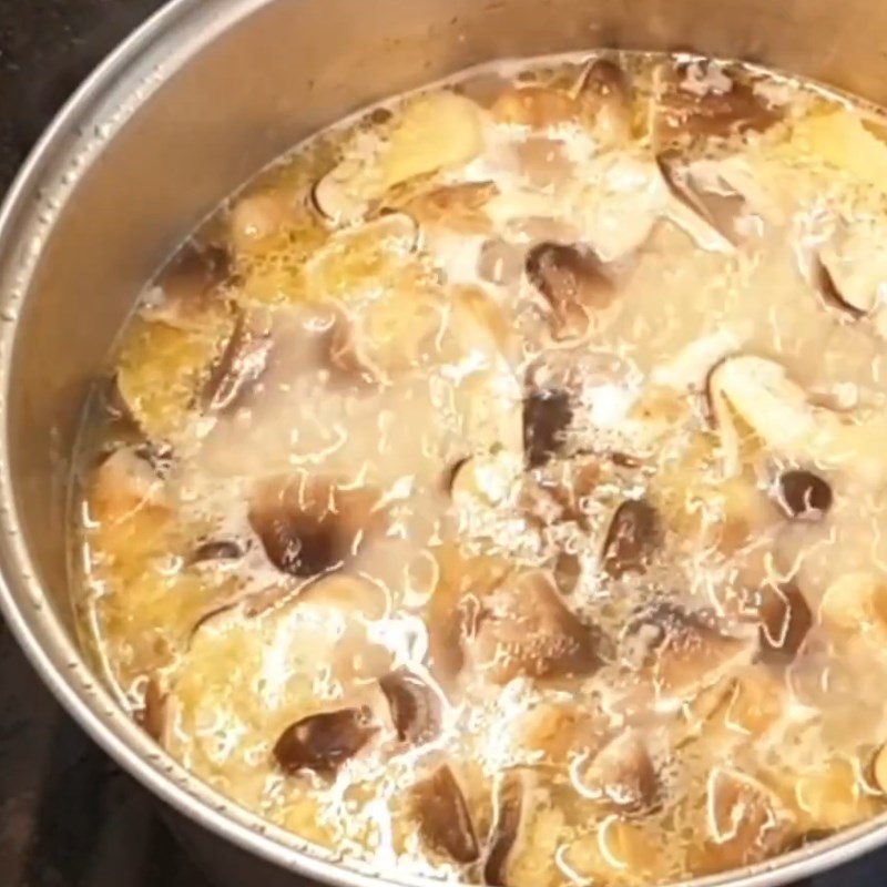 Bước 5 Rang gạo và nấu cháo Cháo gà nấm rơm
