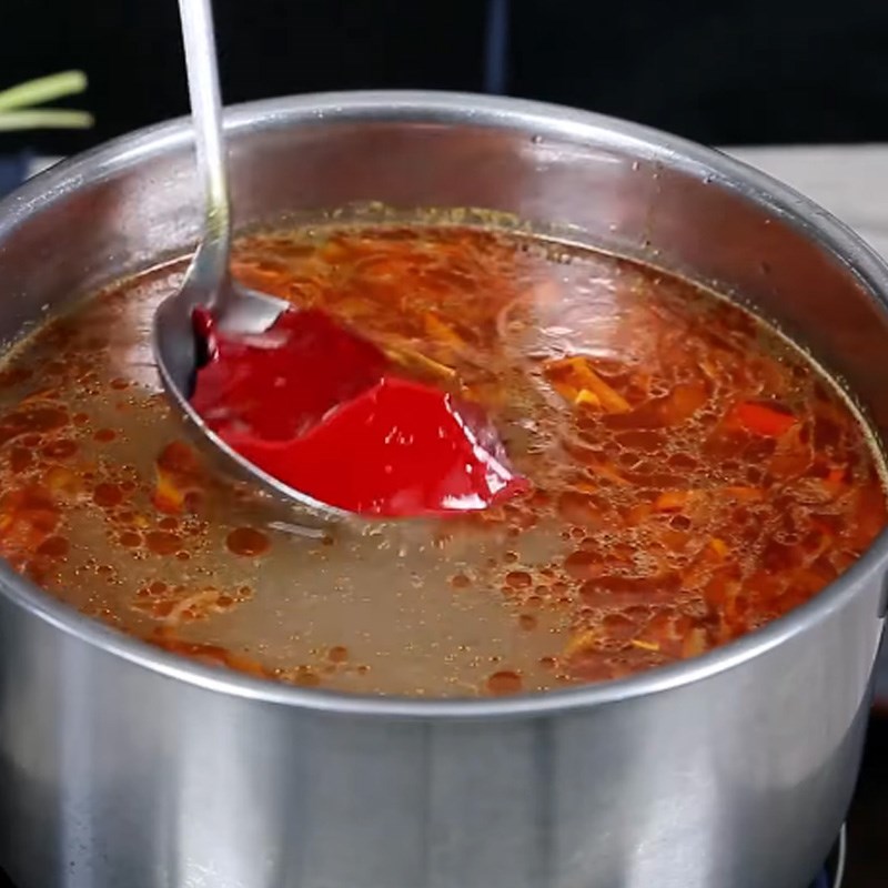 Bước 4 Cho huyết heo vào Canh huyết heo nấu cay