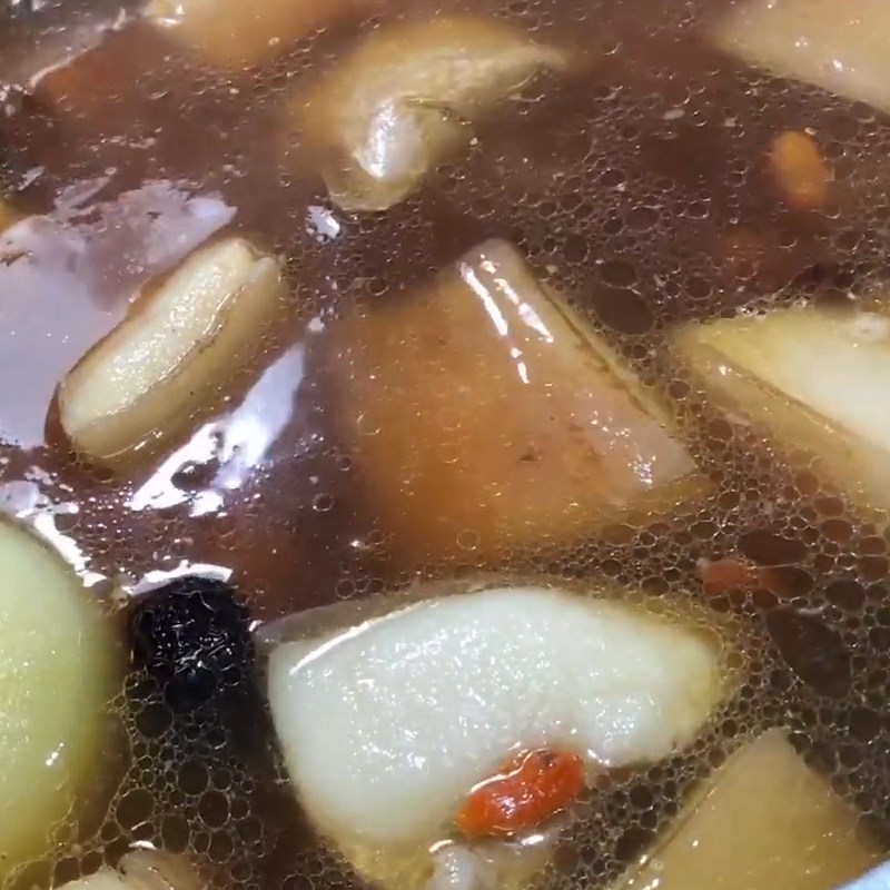 Bước 3 Hầm món ăn Đuôi heo hầm thuốc Bắc