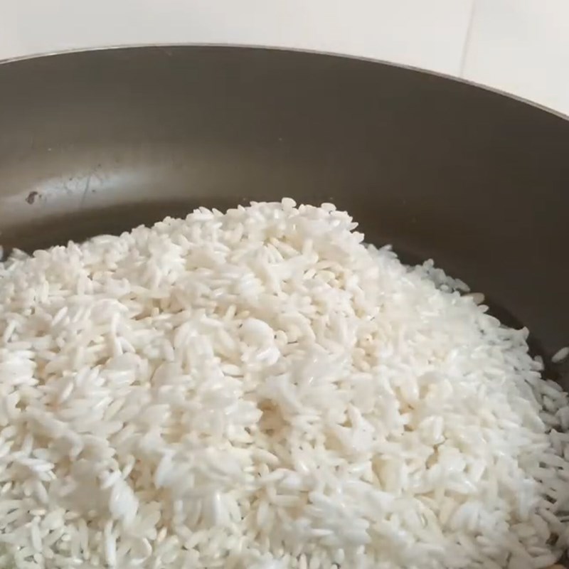 Bước 5 Rang gạo Cháo gà tía tô