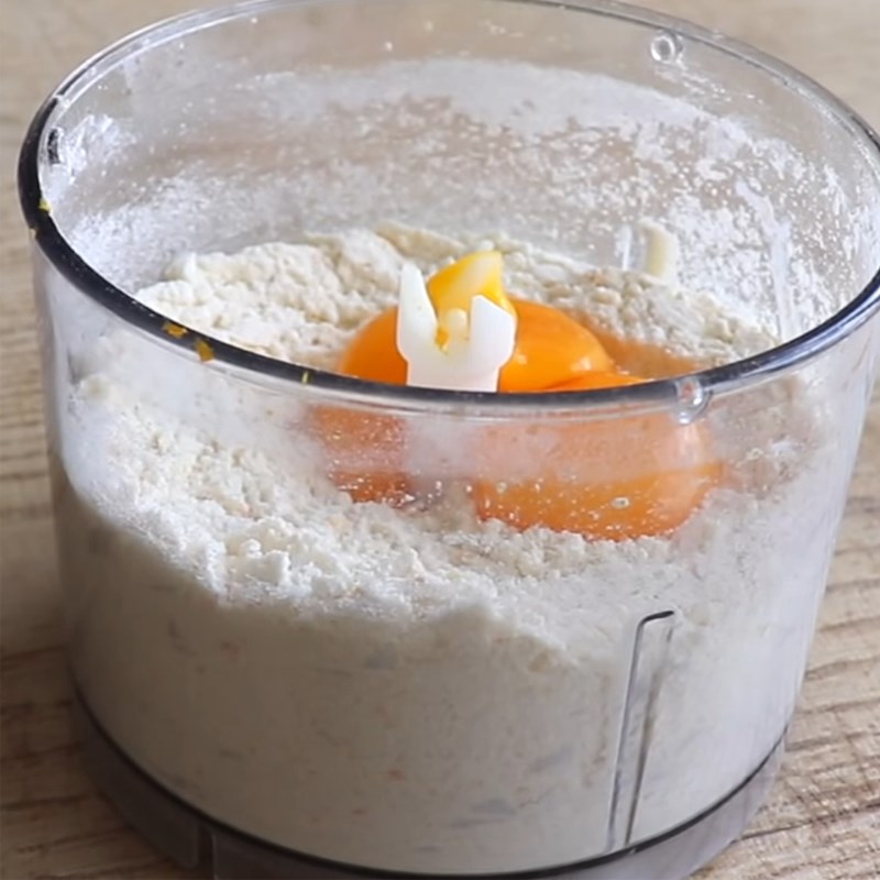 Bước 1 Trộn bột đế bánh Bánh cheesecake cam nướng với bột mì